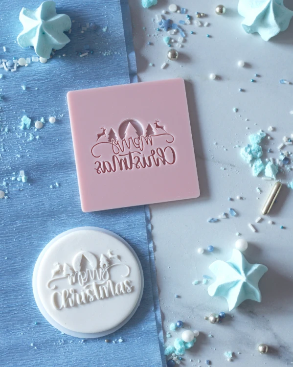 Świąteczny stempel dekoracyjny do masy cukrowej - napis Merry Christmas z jelonkami