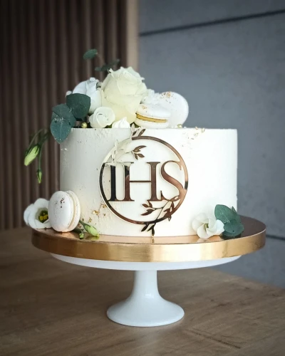 Milove Torty IHS w liściastej obręczy.jpg